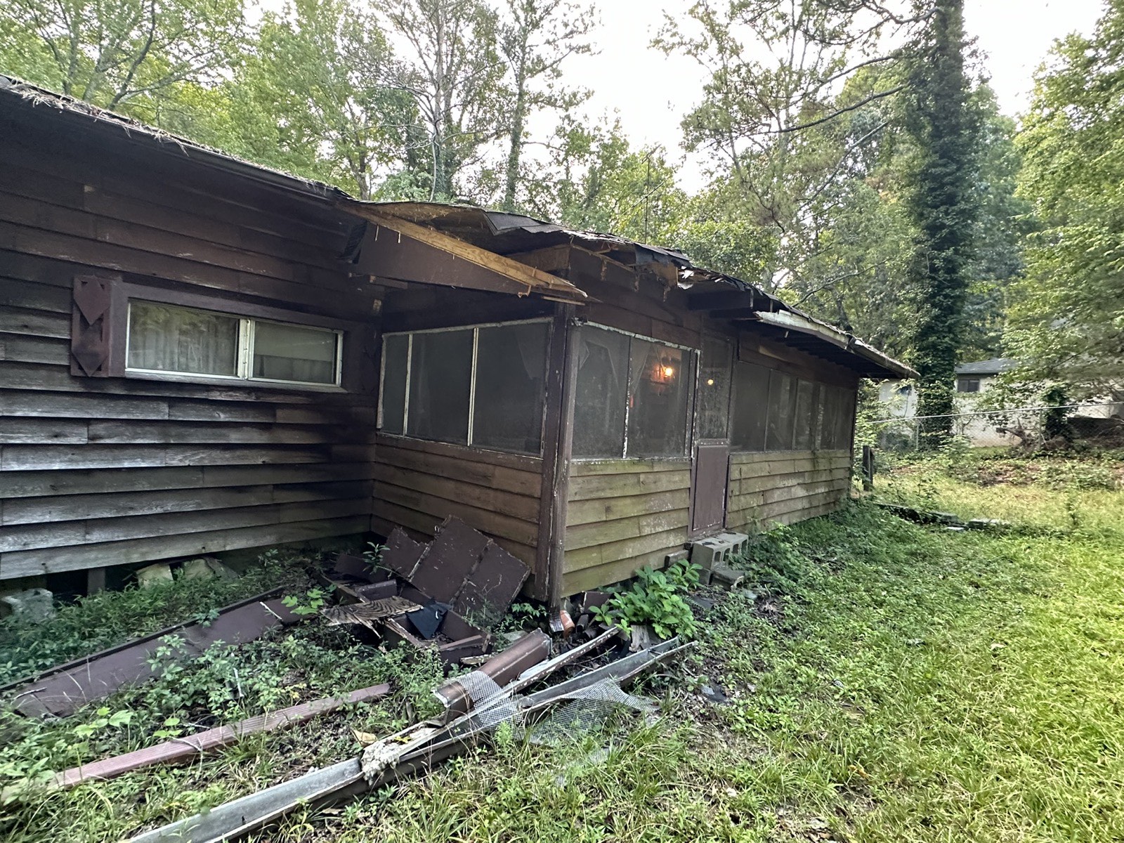 Worn home exterior before renovation